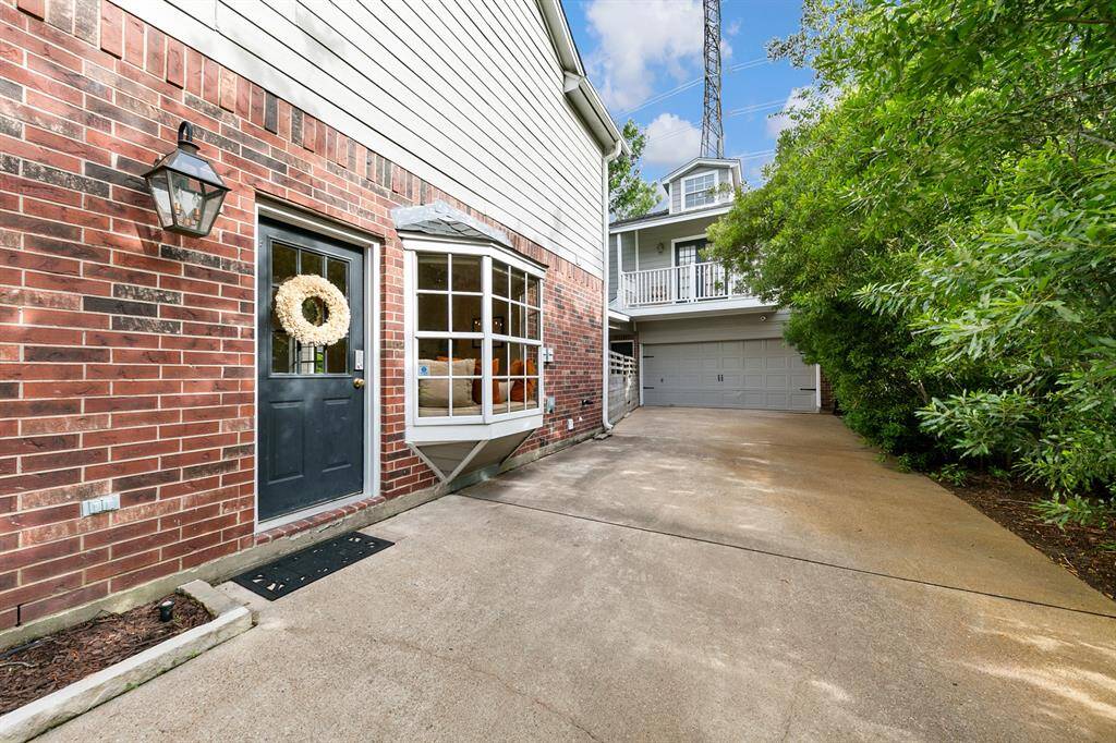 The extra wide, deep driveway provides plenty of room for outdoor play, perfect for everything from basketball to soccer, keeping the whole family active and entertained. A convenient side entrance to the house and backyard adds everyday ease and accessibility.