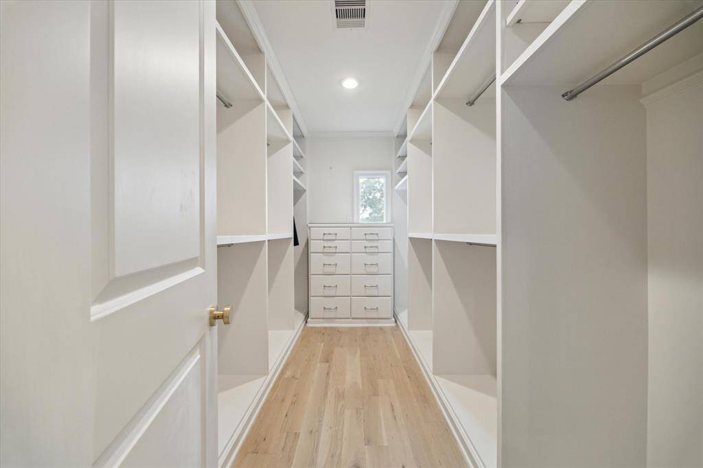 One of the two walk in closets located in the primary bathroom.