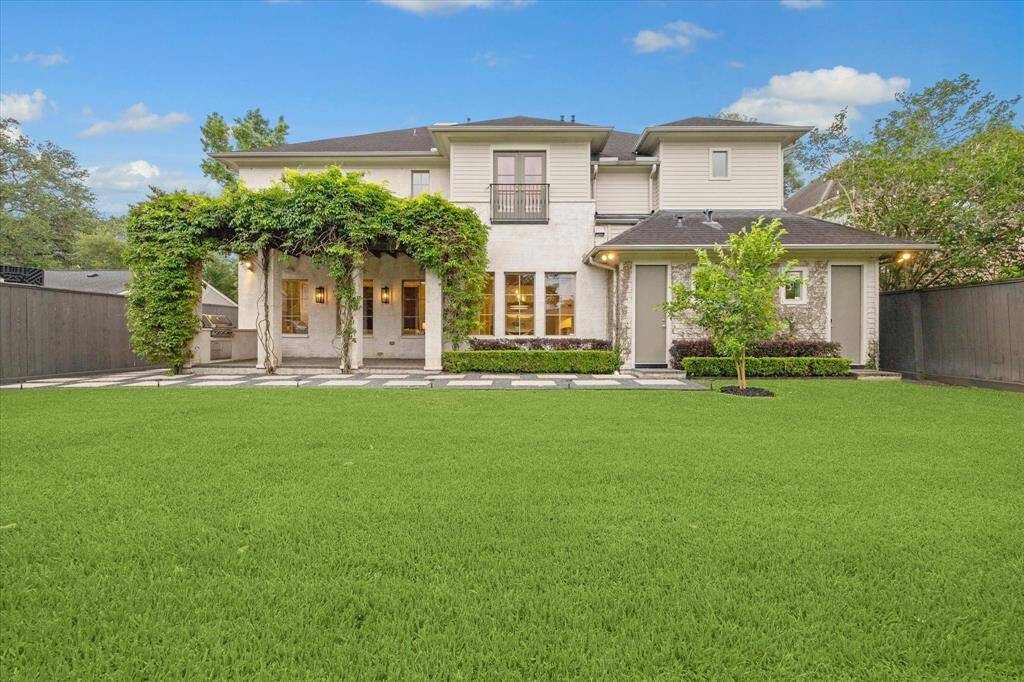 The large yard offers ample space, ready for a future pool, making this outdoor oasis perfect for enjoying warm days and hosting friends and family.