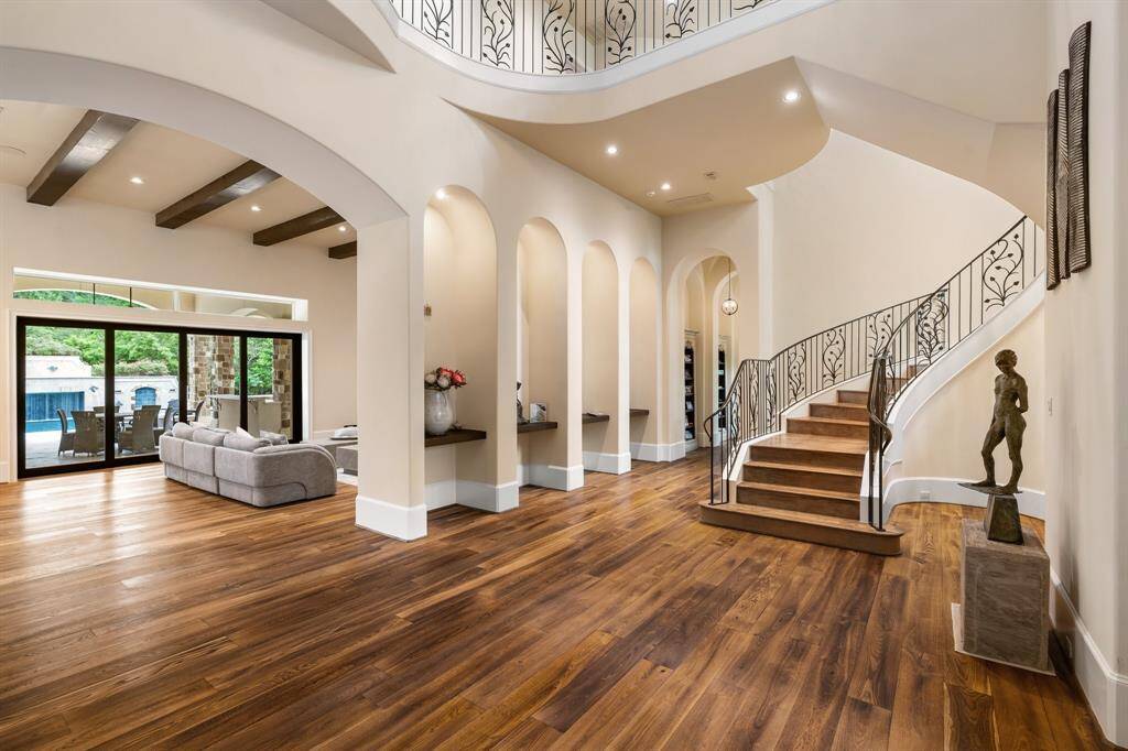 Gentle arched walkways and artfully placed niches add depth and character, creating a harmonious blend of form and function that elevates every space.