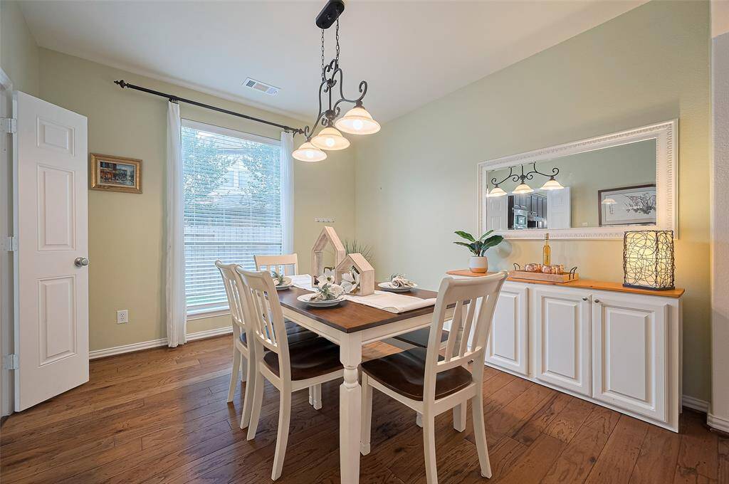 Dining room w/ beautiful wood floor