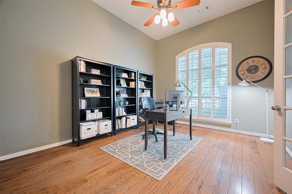 Large Home Office W/ large window with plantation shutters