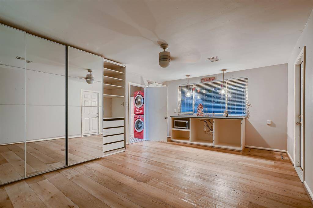 Part of the garage was converted into a 4th bedroom. The 3rd full bath is in the adjacent hall. This was used as a bedroom and would also make a great game room or a playroom.