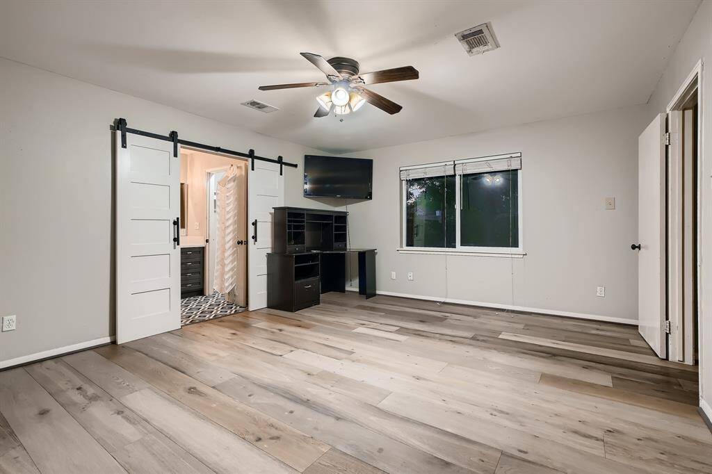The main bedroom features an ensuite bathroom and good closet space.