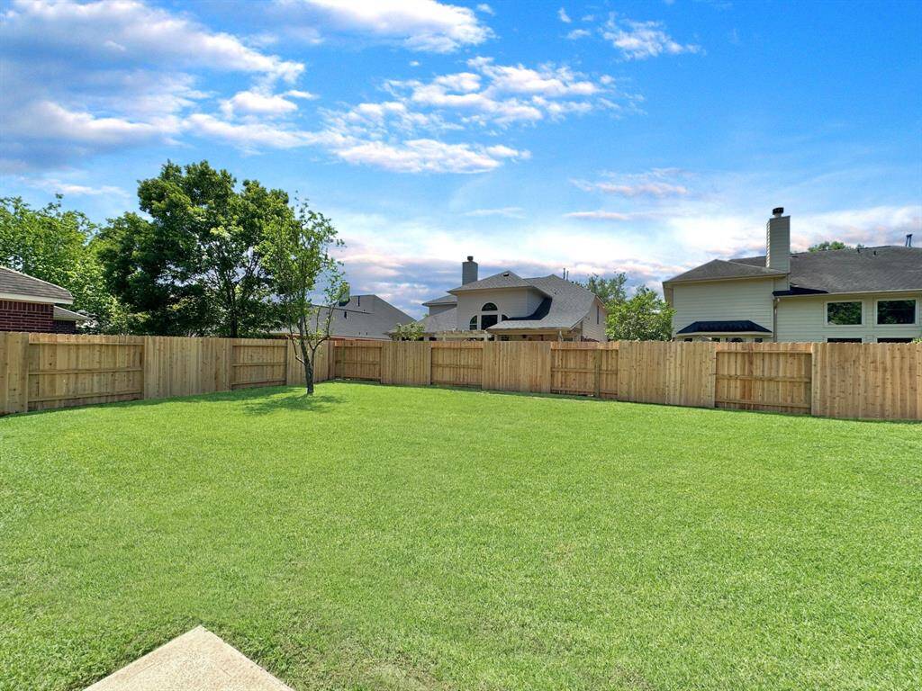 Generous backyard space ready for your personal landscaping touch;New Fence