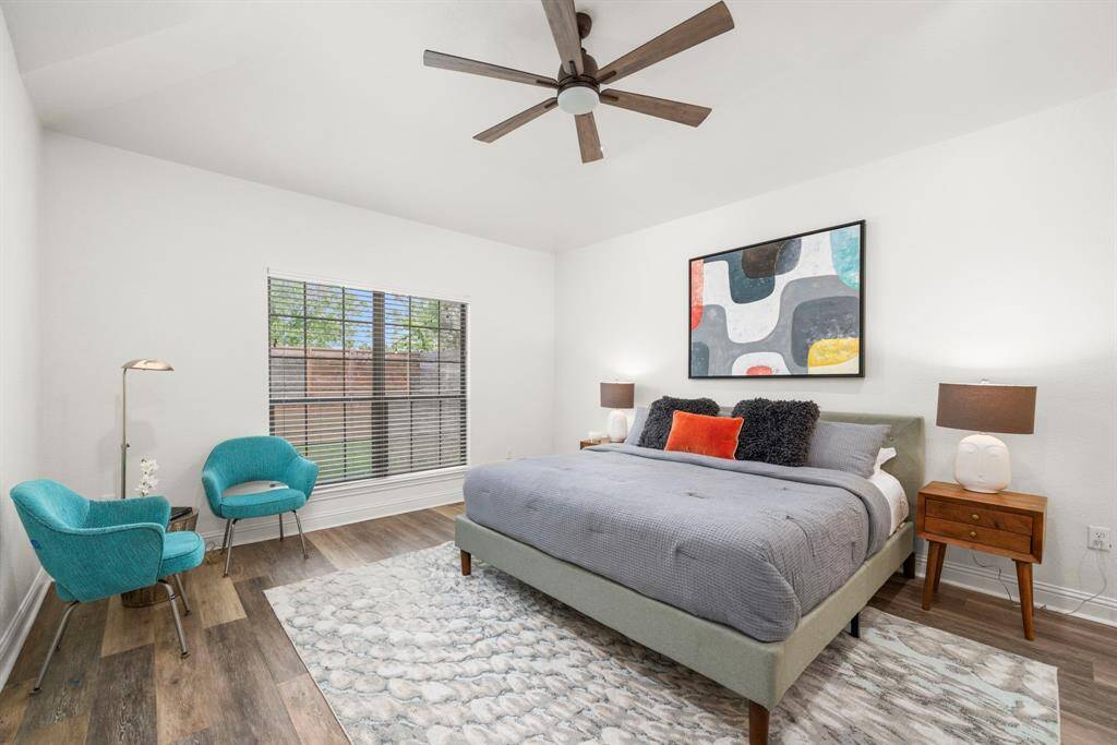 Primary Bedroom Suite - tall ceilings, great natural light and continuation of the same solid flooring throughout.