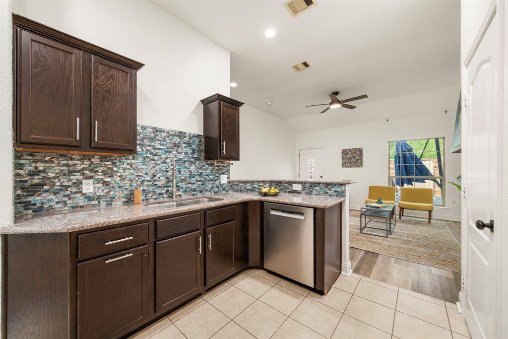 Nicely sized kitchen and although it's open to the family room for easy entertaining, it has a clearly defined space for the non-TV watcher.