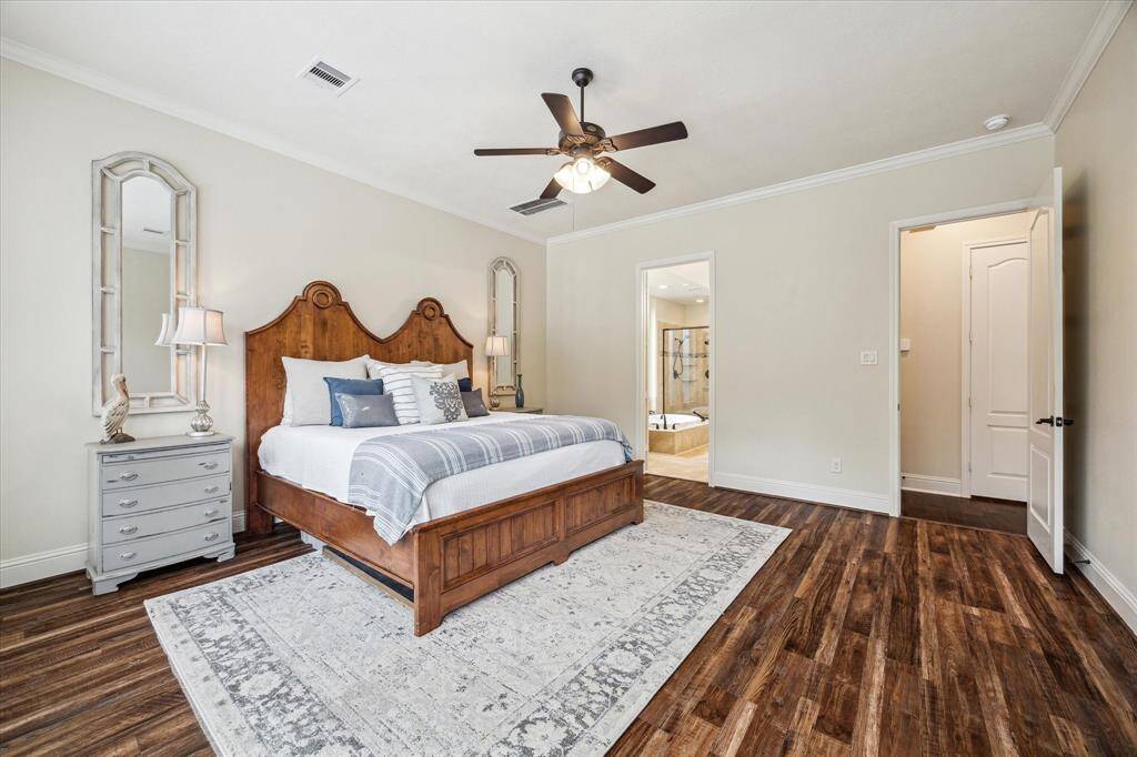 Gorgeous Primary Suite that overlooks the backyard sanctuary making this suite the perfect getaway.