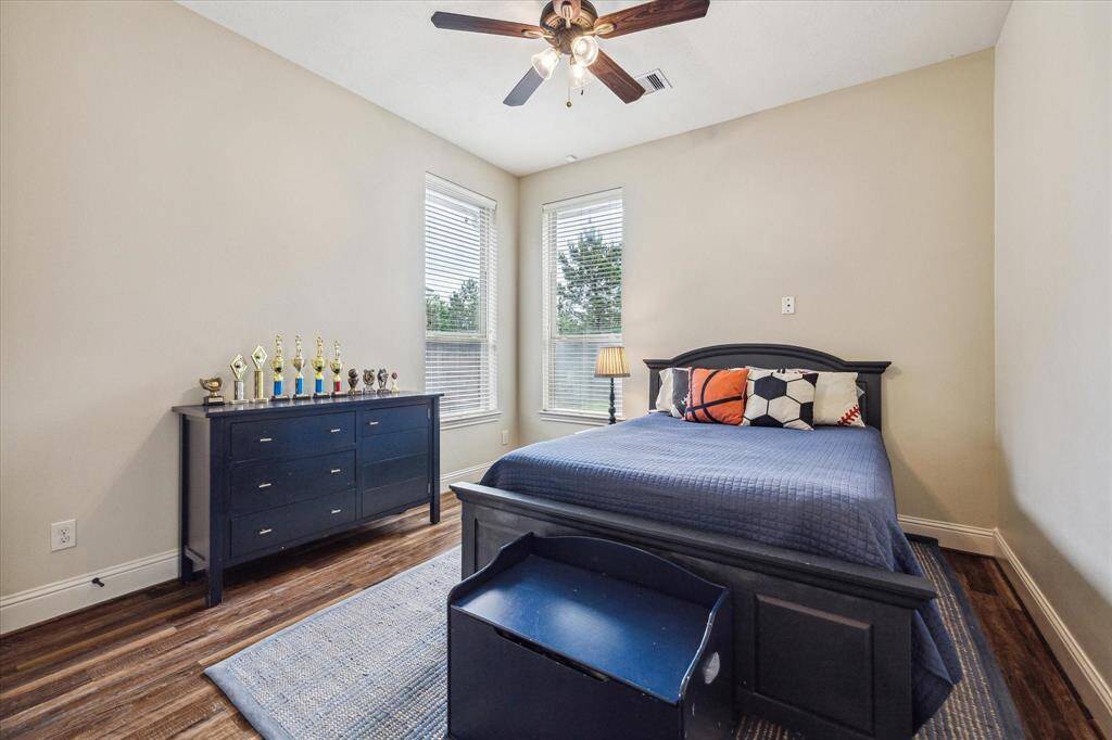 A private study with glass French doors is the perfect setup for those that work from home.