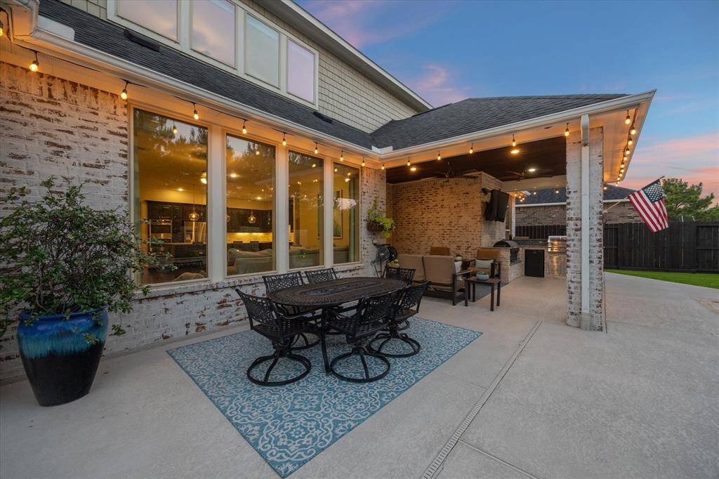 The stone wall and back of property lined with trees creates your own personal sanctuary to enjoy with full privacy!