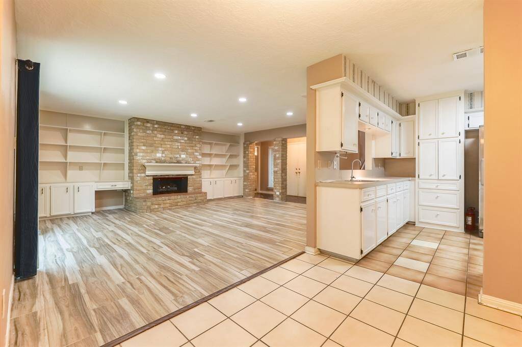 Living area boast beautiful painted cabinetry