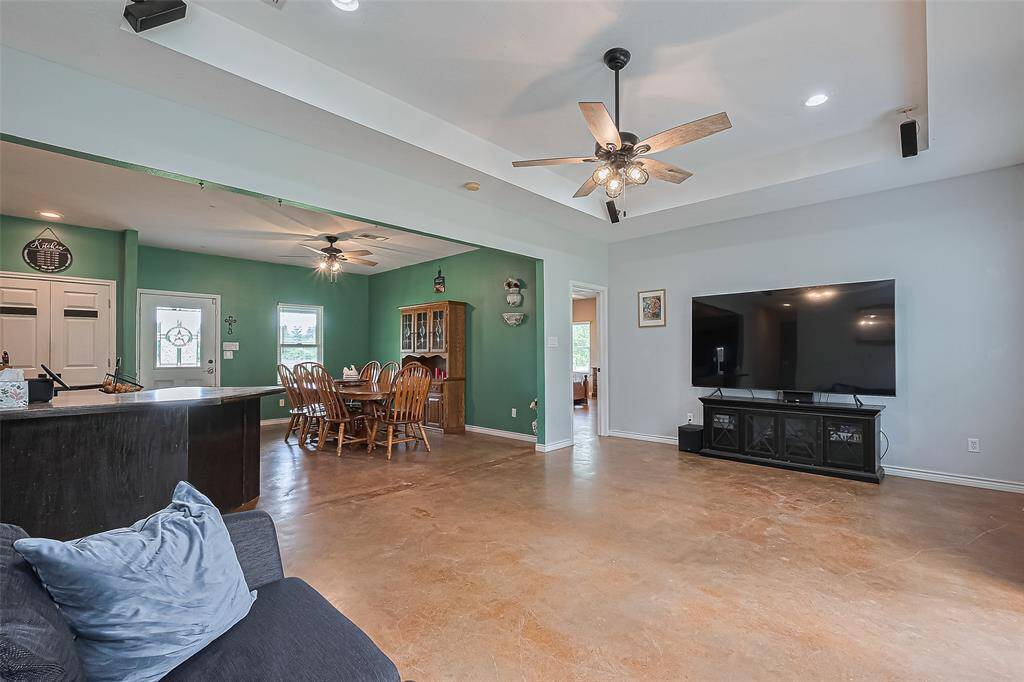 This view highlights the open layout, with sightlines extending from the living room through the dining area—perfect for entertaining.
