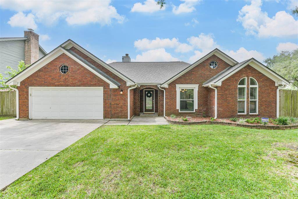 Welcome Home to a 1 story RARE gem in The Oaks!