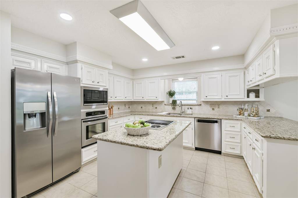 Lots of cabinets and prep area for cooking