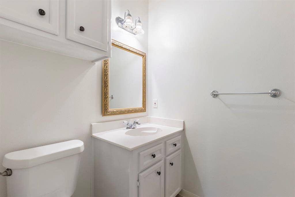 Full pool bathroom right next to the utility room on the first floor.