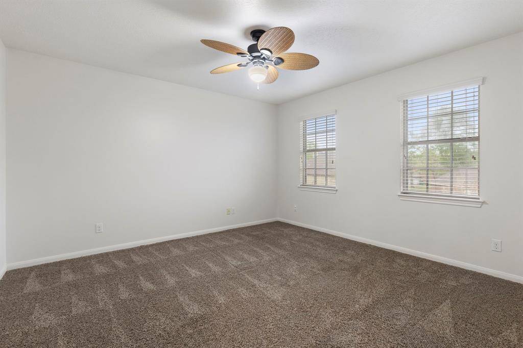 Secondary bedroom #2 with walk-in closet.