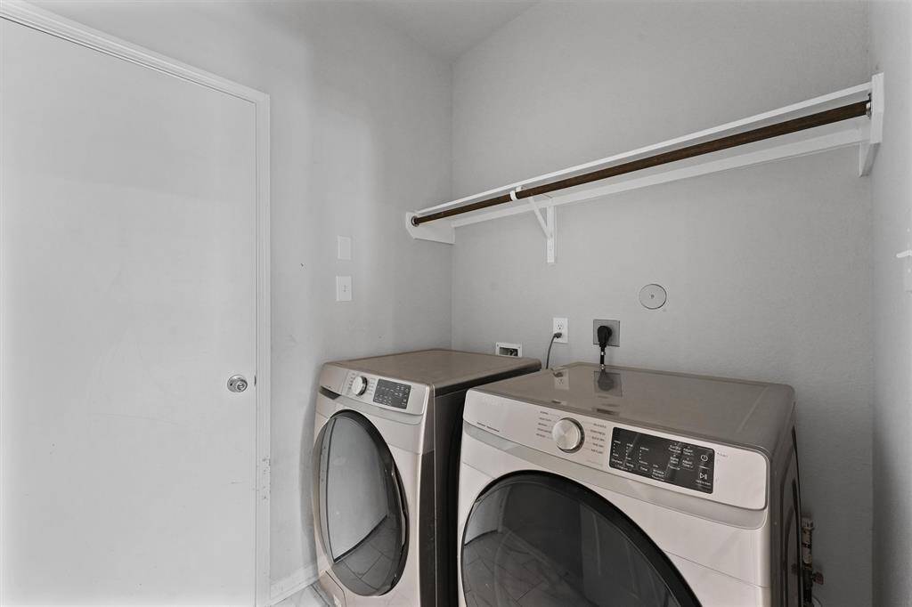 Laundry Room off the side of the kitchen.