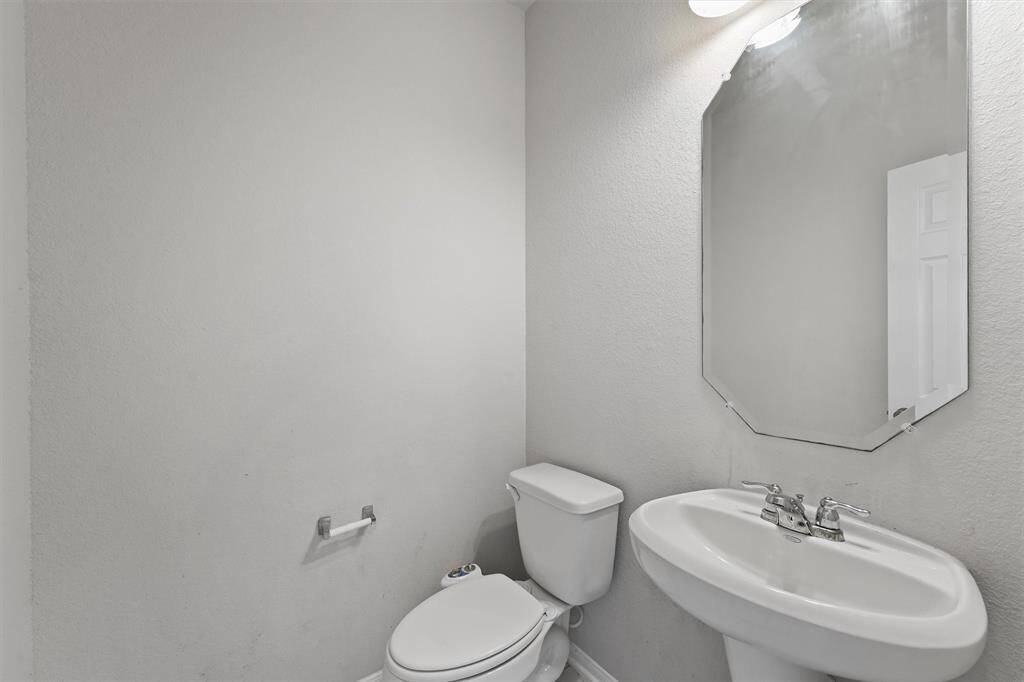 Half-bathroom downstairs for guests.