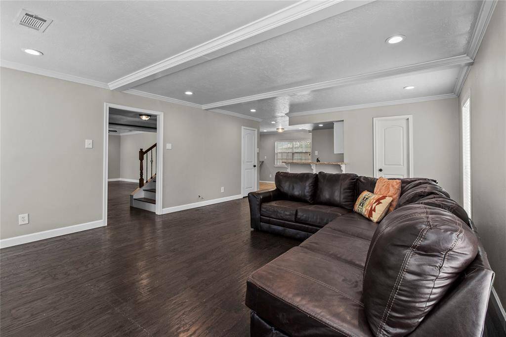 Looking back at the wet bar area. The door in the photo on the right is the door to the perfectly placed half bathroom.