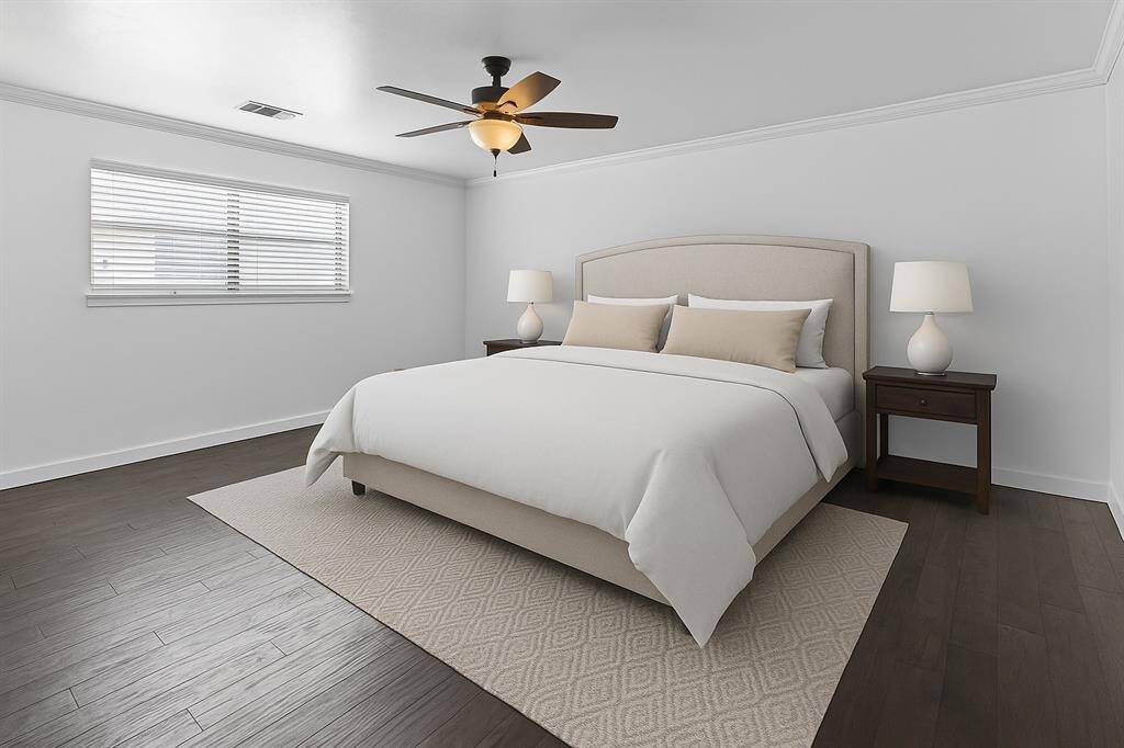 *Virtually staged - The spacious primary bedroom is located to the right at the top of the stairs.