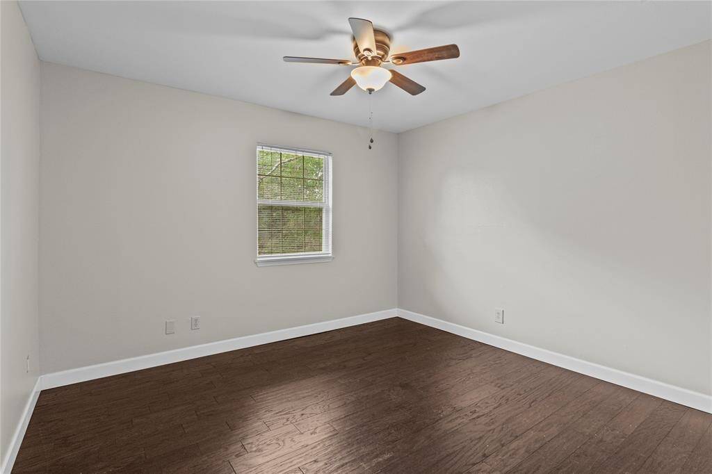 The 4th bedroom is located at the end of the upstairs hallway.