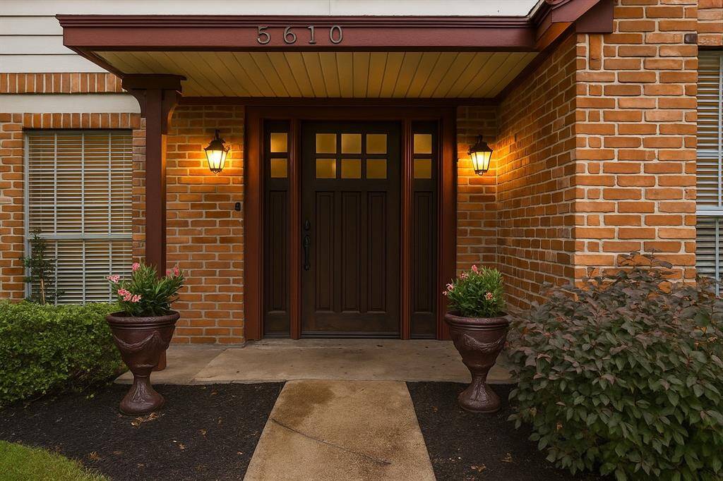 You'll enjoy greeting your guests on your inviting front porch.