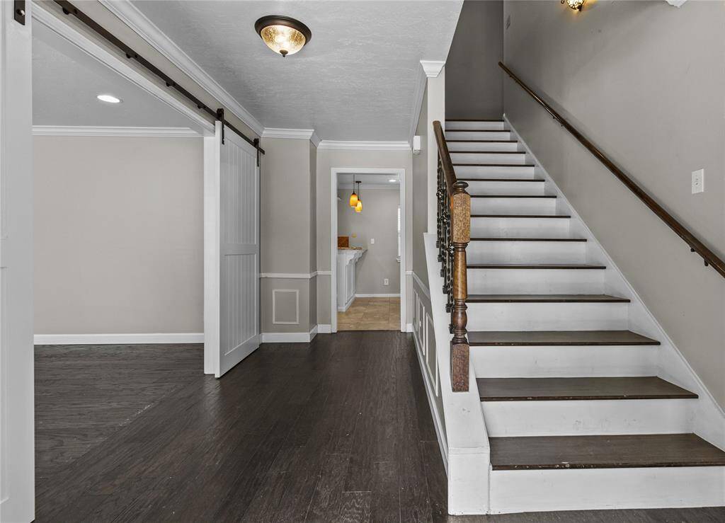 As you enter the home, the opening to the left is the formal dining room.