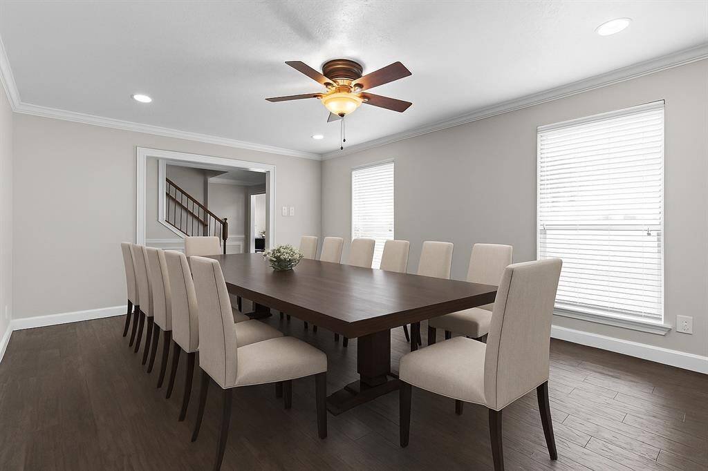The dining room has recessed lights and the ceiling fan can be replaced with your favorite chandelier. *Virtually staged
