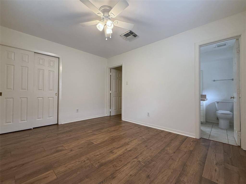 Alternate view of the front/primary bedroom with en-suite bath.