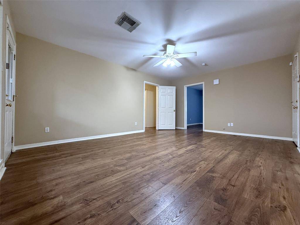 Alternate view of the family/dining combo room. On the opposite side, notice there is a privacy door which opens from the hallway leading to the bedrooms.