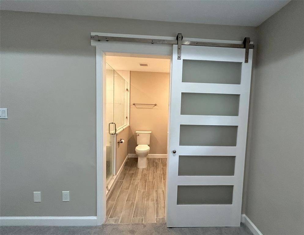 Sliding Barn-Door to Primary En-Suite