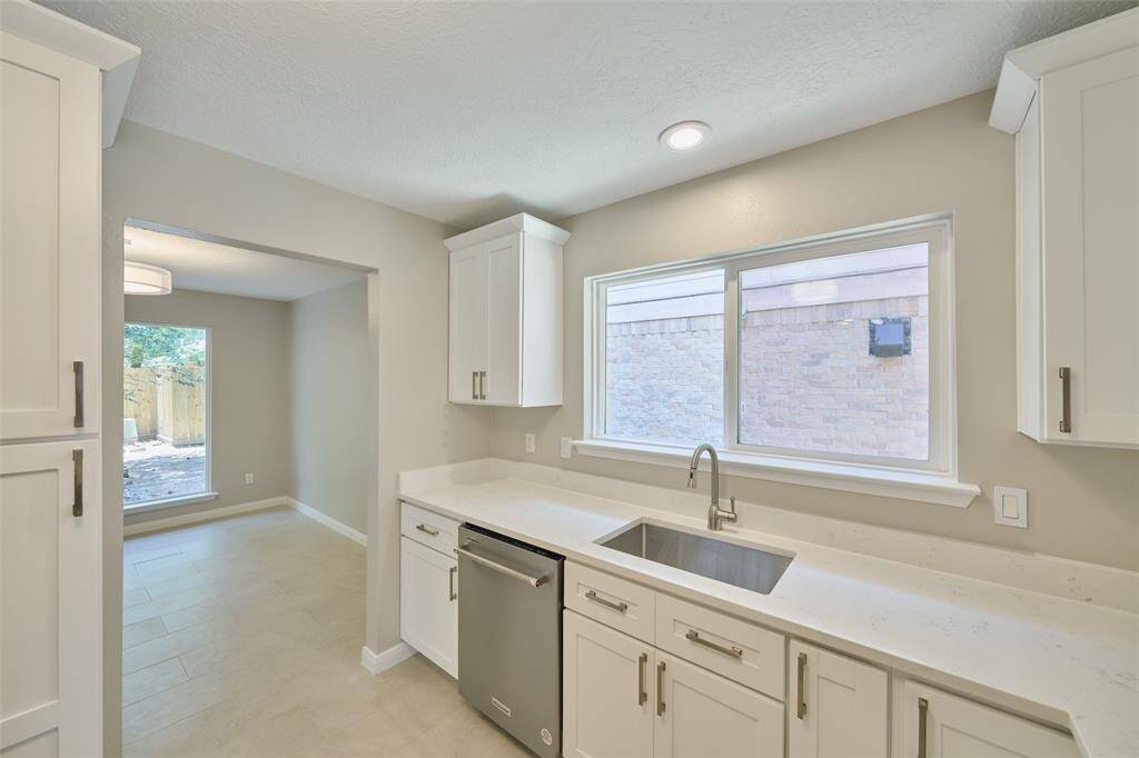 Kitchen with entry into dining area.