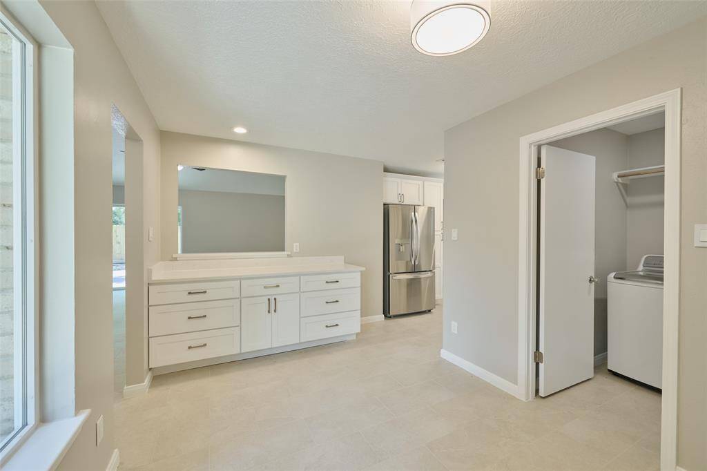 Another view of the kitchen, breakfast and utility room.