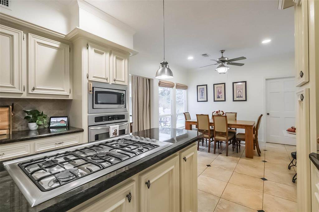 This kitchen has lots of storage space, a 7-stage water filtration system, and boiling water tap.