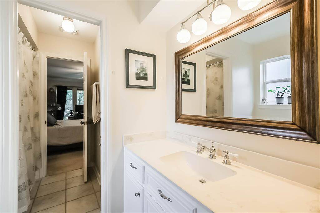 Secondary bathroom features atub/shower combo and long vanitywith plenty of counter space.