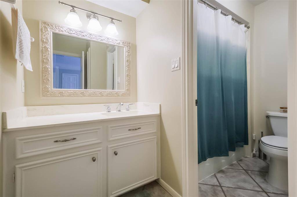 Third bathroom features atub/shower combo and long vanitywith plenty of counter space.