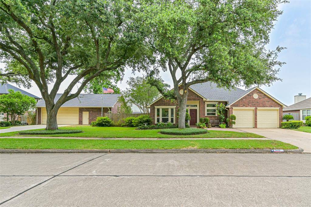 Welcome to 610 Bayou Bend—situated on a spacious 13,722 sq ft double lot.