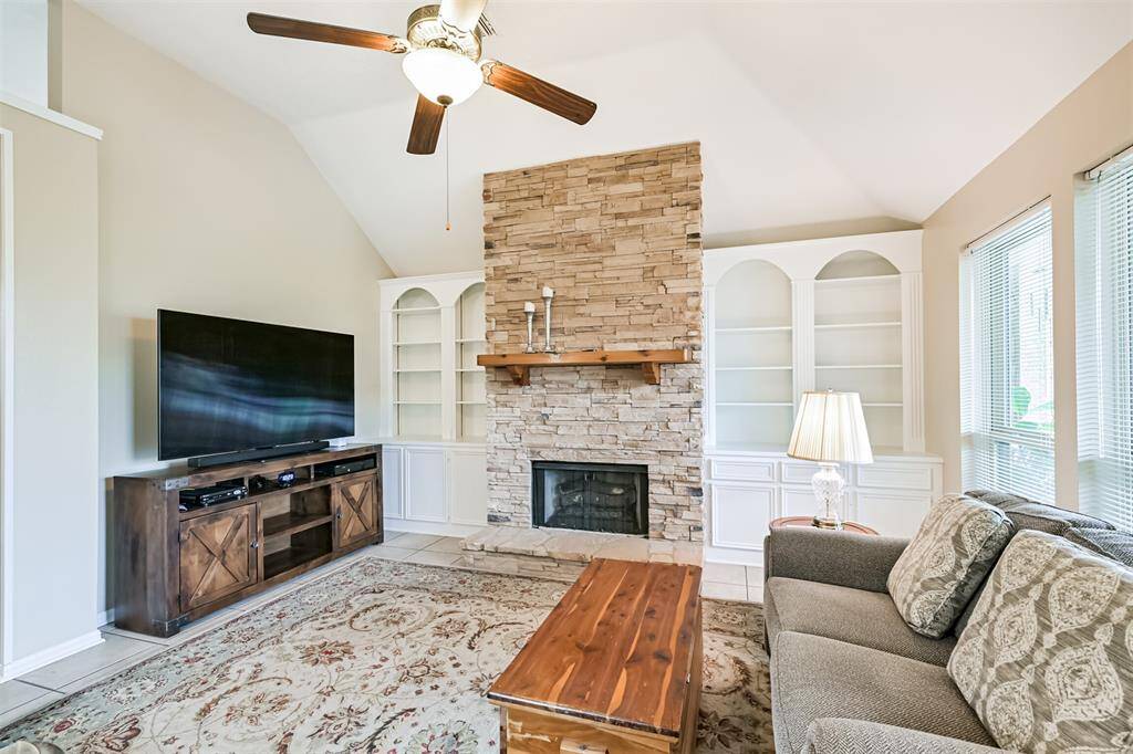 Gas log fireplace creates the perfect ambiance.