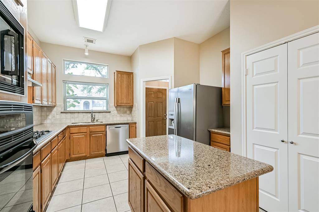 Sleek Silestone countertops.