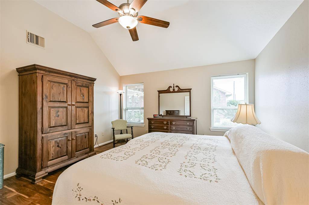 Spacious primary suite with room for a king-sized bed and more.