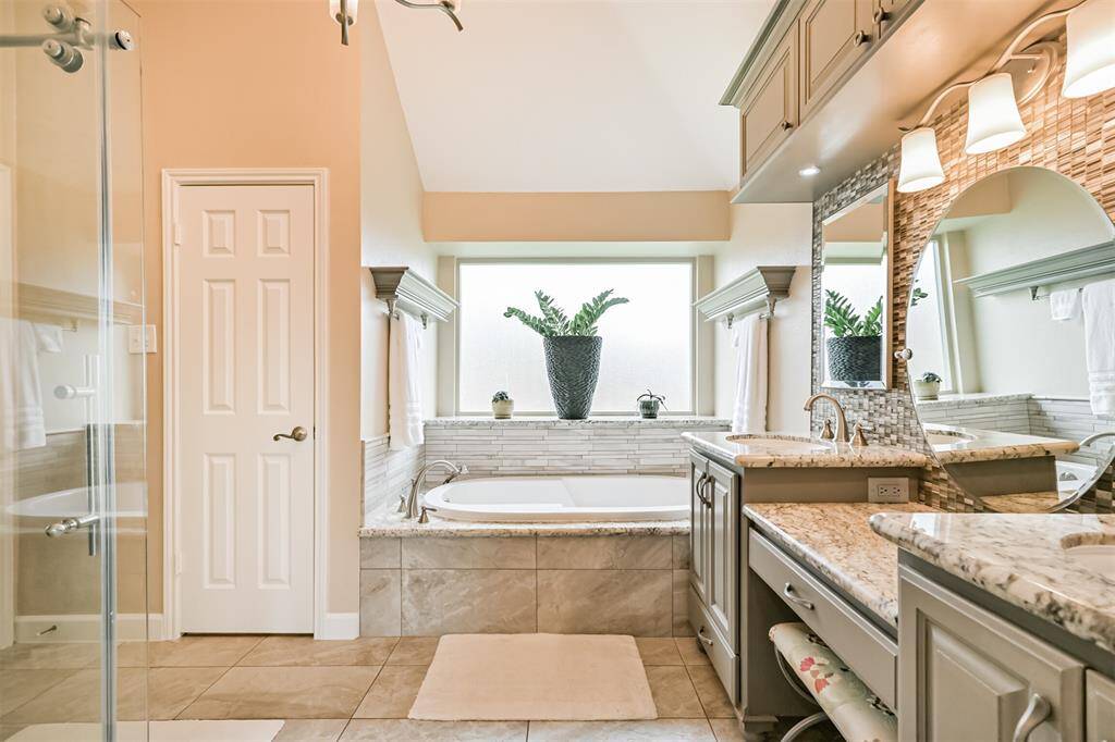 Large windows flood the room with natural light.