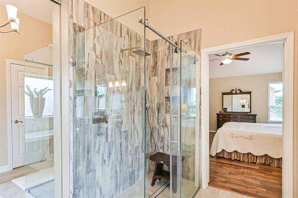 Elegant tile work adds a designer touch to the bath.