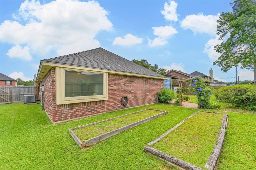 Private backyard oasis with plenty of green space and privacy.