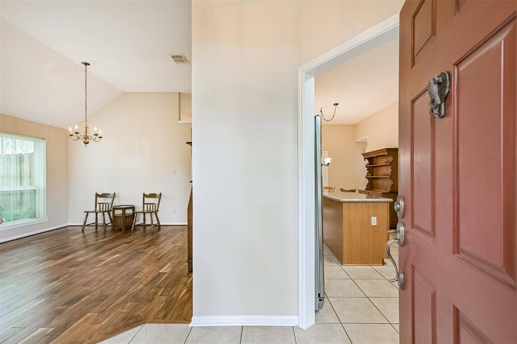 Foyer offers a graceful transition from exterior curb appeal to interior comfort.