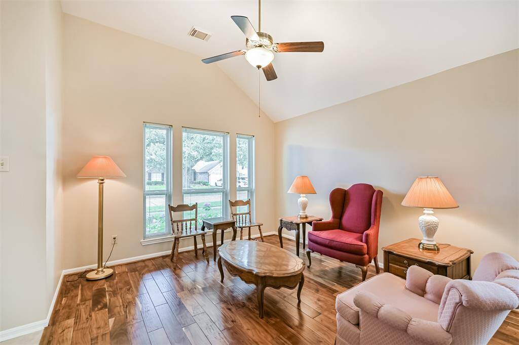 Engineered Acacia hardwood flooring adds warmth and elegance.
