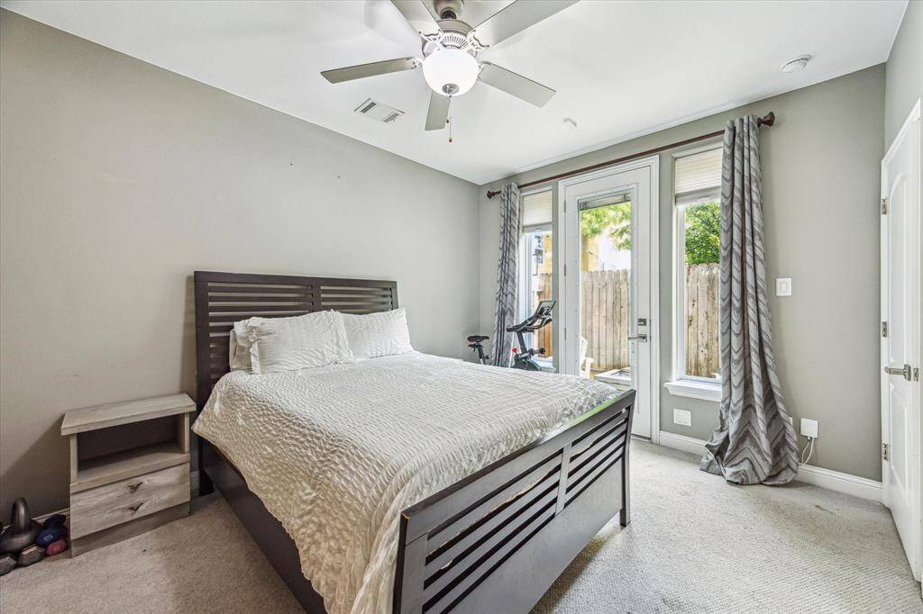 Your family or guests will love this private first-floor retreat with direct backyard access, a private ensuite bath, and plenty of space to relax. Large windows bring in natural light, while neutral finishes make it easy to personalize.