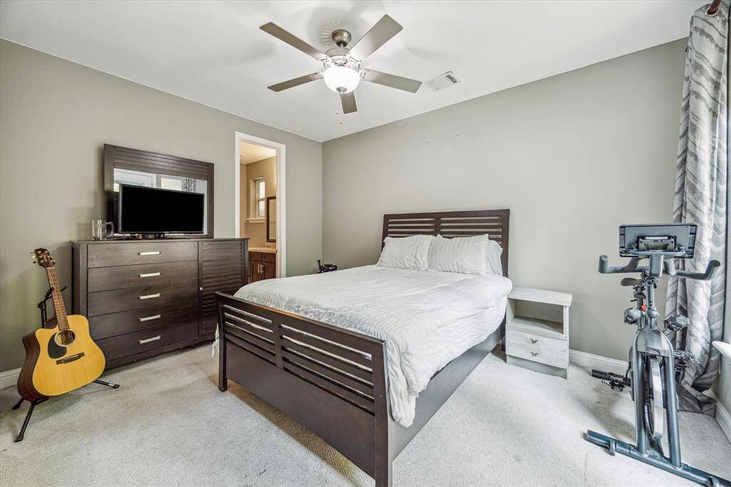 This spacious first-floor suite offers soft neutral finishes, a large closet, private ensuite bath, and direct access to the backyard and patio. It’s the perfect setup for guests, extended stays, or even a quiet home office.