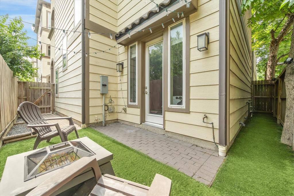 Tucked just outside the first-floor suite, this private outdoor space is ready for your favorite lounge chair, potted plants, or a cozy café table. With a paver patio and low-maintenance turf, it's the perfect blank canvas to create your own little backyard escape.