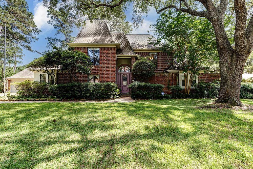 Front of House with expansive front yard