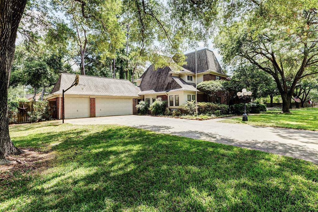 3 car garage with wide driveway